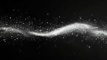 A wave of white particles on a black background, glittering silver dust in motion.