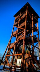 wooden tower during winter © Marcin