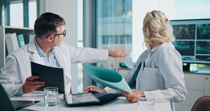 Doctor, team or pointing with x ray or documents for medical procedure, patient history or clinic report at hospital. Man, woman or healthcare surgeons with CT scan, test results or exam for autopsy