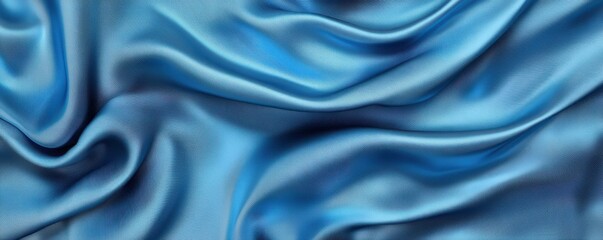 Fototapeta premium Luxurious blue satin fabric with elegant waves and soft texture for stylish designs
