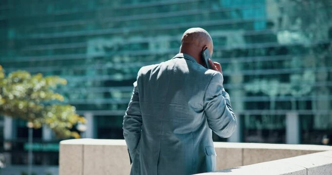 Black man, city and phone call for business, negotiation and talk to investor for funding on rooftop. Outdoor, developer and discussion with client for financial support, urban project and pitch idea
