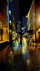 illuminated street during Christmas in winter © Marcin