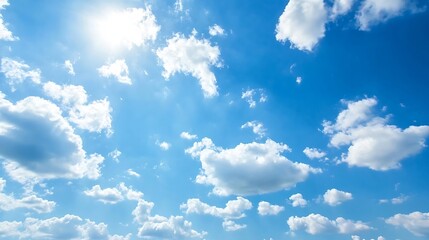 Fototapeta premium Bright blue sky filled with fluffy white clouds radiating sunshine and creating a peaceful atmosphere : Generative AI
