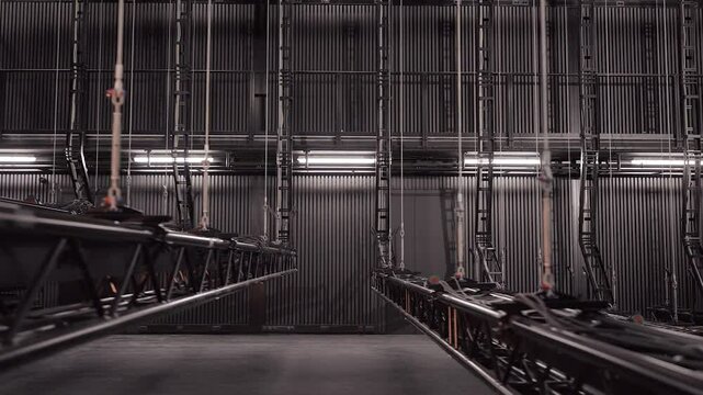 Many Large Theater Trusses are Lifted in the Black Box in the Wave. In Theaters, a Batten, Also Known as a Bar or Pipe, is a Long Metal Pipe Suspended Above the Stage for Things to be Hung.