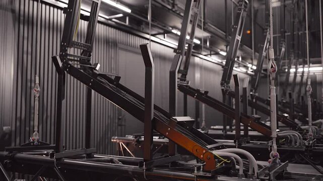 Large Theater Trusses are Rised with Metal Cable Organisers Folding Mechanism. In Theaters, a Batten, Also Known as a Bar or Pipe, is a Long Metal Pipe Suspended Above the Stage for Hunging Things.