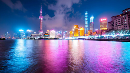 Obraz premium Shanghai skyline at night, reflecting on river. Travel, city, tourism promotion