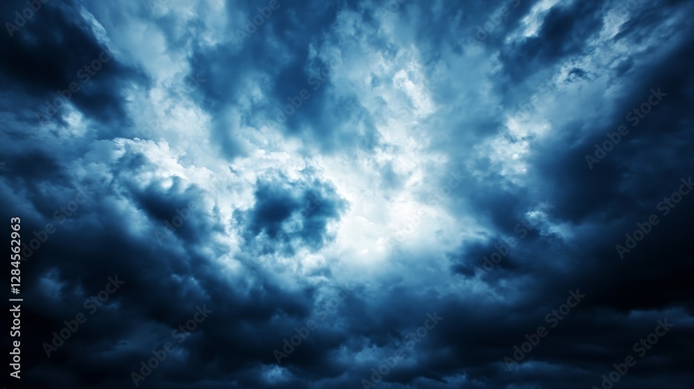 Poster dramatic dark stormy sky filled with thick clouds creating a moody and intense atmosphere : generati