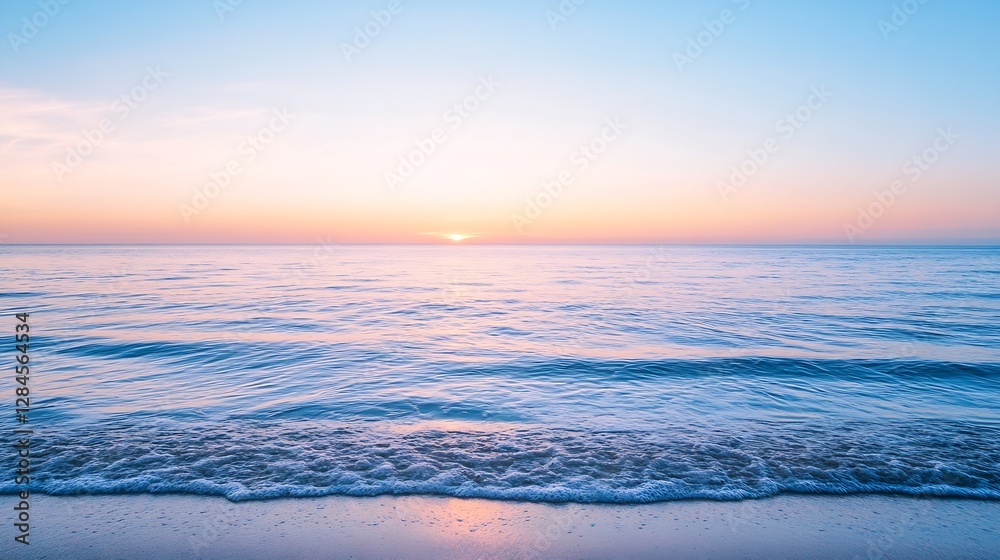 Aufkleber tranquil scene of a serene sunset over the ocean with soft waves reflecting pastel colors in the sky