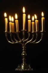 A traditional Jewish candelabra with golden candles, used to celebrate Hanukkah and other religious rituals.