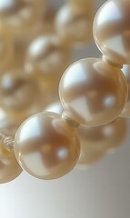 Close-up pearl necklace, studio, light background, jewelry advert