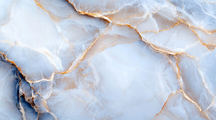 Fototapeta premium Elegant white and gold marble texture with intricate patterns and cracks, showcasing luxurious natural stone aesthetics.