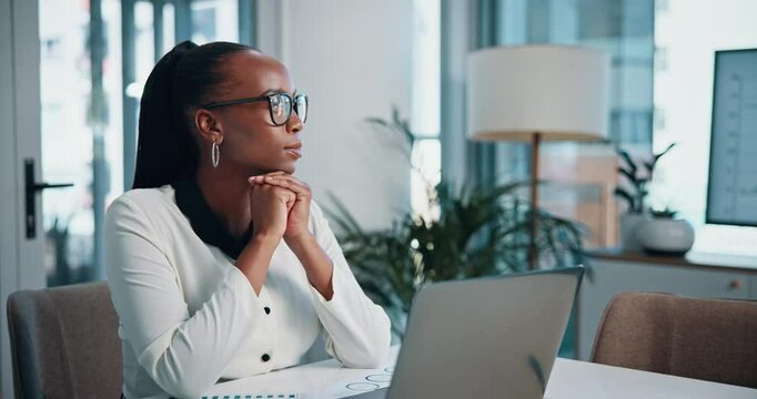 Black woman, thinking and laptop in office with charts, break and worry for economy at financial agency. Person, investor and computer for stock market, trading and problem solving at startup company