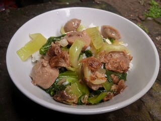Saute mustard greens and meatballs