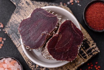 Smoked horse meat with salt, spices and herbs