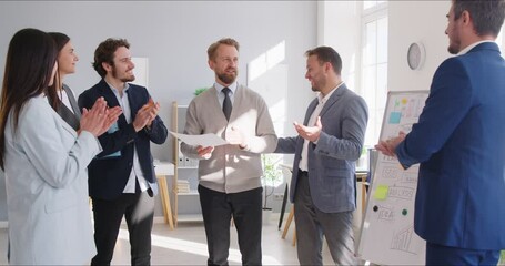 Business diverse team clapping expressing recognition, appreciation, acknowledge to leader, congratulating boss on achieve, good work result, applauding promoted coworker, office celebration winner