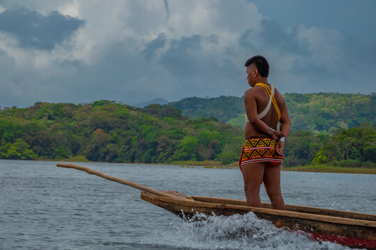 An Ember&aacute; man leading a conoe expenditions to the surveying Parar&aacute; Puru village, Chagres National Park, Panama