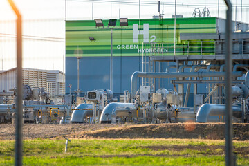 Green Hydrogen renewable energy production pipeline - green hydrogen gas for clean electricity solar and windturbine facility
