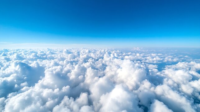 Aerial view of fluffy white clouds spread across a bright blue sky during daytime : Generative AI