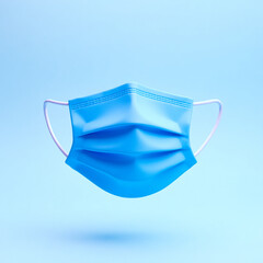 light blue pleated face mask on a light blue background