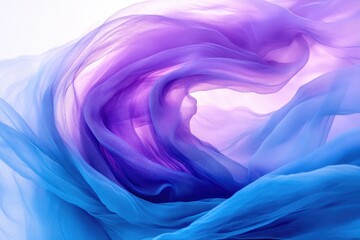Obraz premium Swirling ombre chiffon fabric in shades of blue and purple, creating a dreamy, abstract texture.