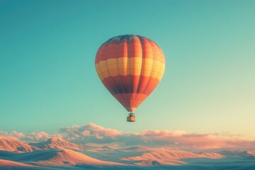 Fototapeta premium A vibrant hot air balloon gracefully floats over a serene, sun-kissed landscape.