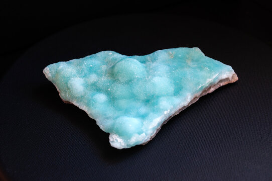 Blue hemimorphite isolated on black background