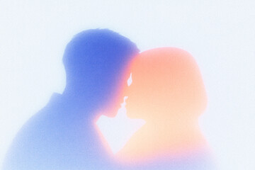 Silhouetted couple in soft focus with dreamy lighting effects