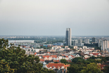 aerial view of the modern industrial side of city with stadium and skyscrapper