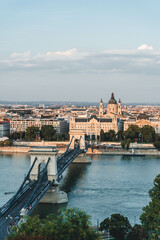 view of caathedral church hungarian catholic with big bell towers in front and dome over the city skyline