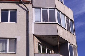 A tall building with a clock tower, suitable for use in cityscape or architecture illustrations.
