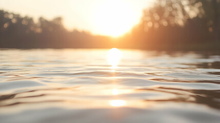 Golden sunset reflecting on calm river water