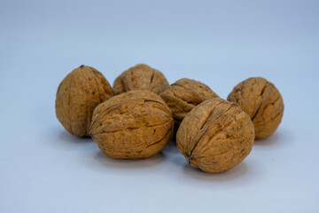 Walnuts in shell and natural brown tones