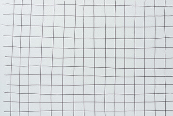 blank, textured, paper sheet with uneven black ink grid