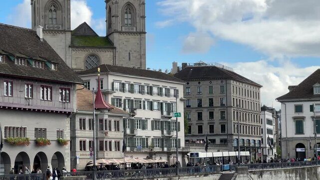 Zurich, Switzerland, Z&uuml;rich historic city center with Grossm&uuml;nster towers in the backgroud, Limmat river, Grossmunster is a Romanesque-style Protestant church in Z&uuml;rich, Switzerland