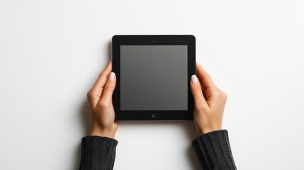Two hands grasp a tablet against a transparent backdrop, featuring a blank screen, centrally positioned and emphasized for potential content display, with room for text.
