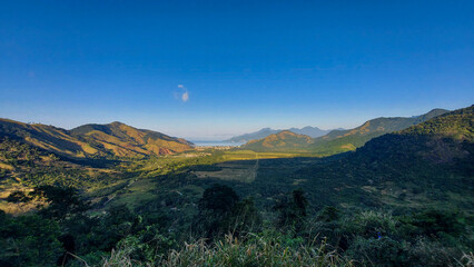 a landscape with valley and mountains