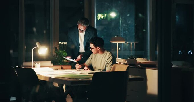 Night, tablet and businessmen in office with documents for global investment clients with profit margin. Digital technology, deadline and manager with finance planner for feedback on revenue growth.