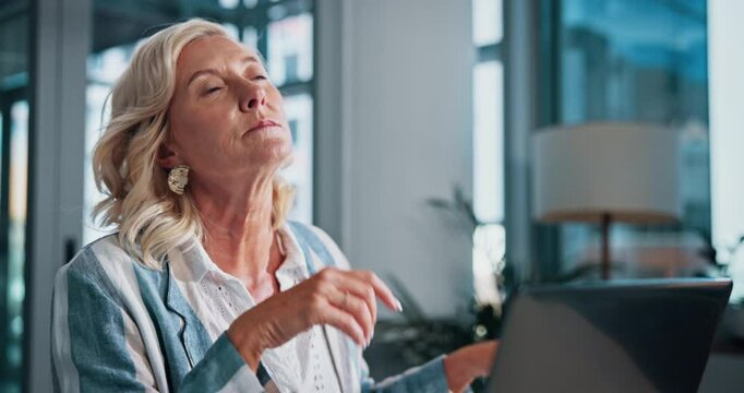 Mature woman, headache and laptop in office with eye fatigue, stress and glasses at startup company. Person, computer and pain with tired vision, exhausted and burnout with deadline for project