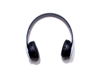 Modern headphones with advanced sound technology, featuring sleek design and high-quality audio performance, isolated on a neutral background.