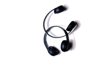 Modern headphones with advanced sound technology, featuring sleek design and high-quality audio performance, isolated on a neutral background.