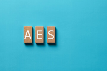 There is wood block with the word AES. It is an abbreviation for Advanced Encryption Standard as...