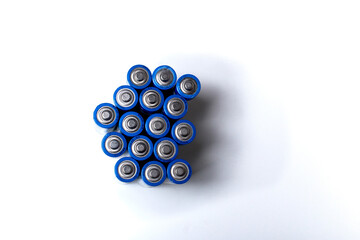 A close-up of AA batteries, essential for powering a wide range of devices, from remote controls to toys, providing reliable energy and convenience for everyday use.