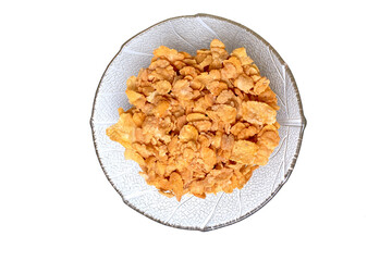 A bowl of fitness cereal, a healthy and nutritious breakfast choice packed with grains, seeds, and dried fruit for an energy boost to start the day.