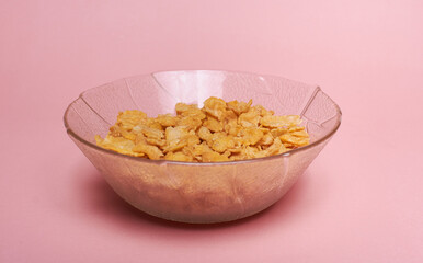 A bowl of fitness cereal, a healthy and nutritious breakfast choice packed with grains, seeds, and dried fruit for an energy boost to start the day.