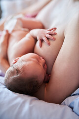 Baby birth, mother and skin with breastfeeding in hospital for nutrition, bonding and immune protection. New life, woman and feeding newborn on clinic bed for connection, child development and health