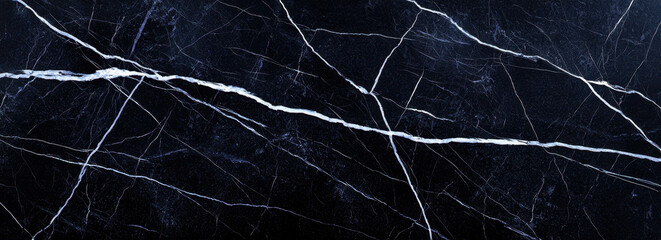 High end black marble with bold streaks of icy white, perfect for luxury design