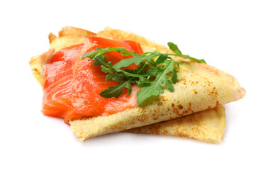 Delicious crepes with salmon and arugula isolated on white