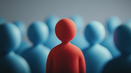 A person wearing dark glowing orange is standing in the center of an audience, facing backward with their back to us.