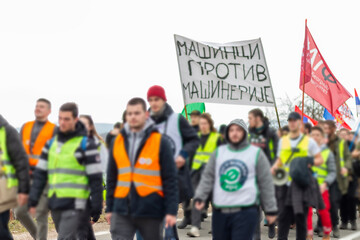 Kragujevac, Serbia – February 14th, 2025 - A peaceful marching of students holding flags and...