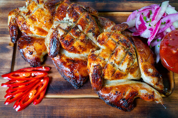 Delicious grilled chicken served with fresh toppings and sides